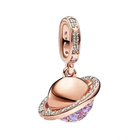 Sterling rose gold Saturn charm with crystal accents, perfect for celestial-themed jewelry.