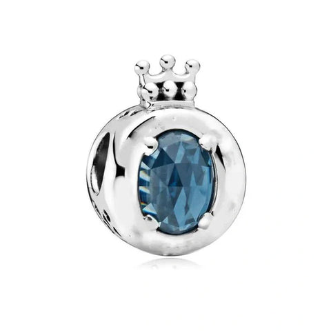 Crowned Royal Blue Gemstone Charm in Sterling Silver - Sterling silver charm with a royal blue gemstone, topped with a small crown for a regal, elegant touch.