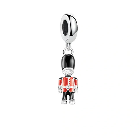 Silver and enamel British guard charm.