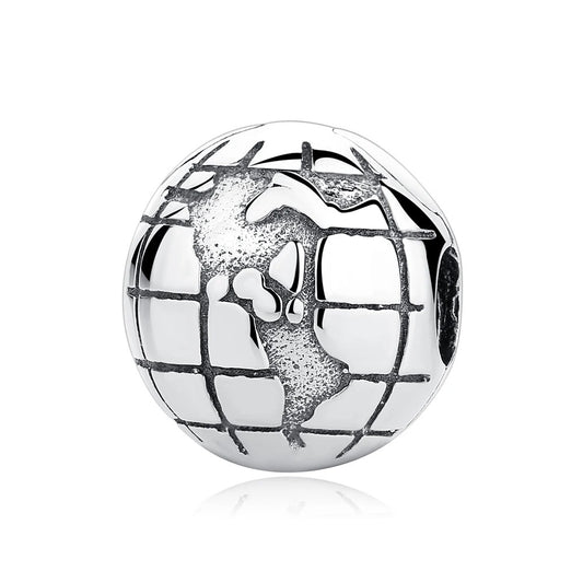 A round silver clip-on charm shaped like a globe, featuring raised continental landmasses and an oxidized latitude-longitude grid pattern