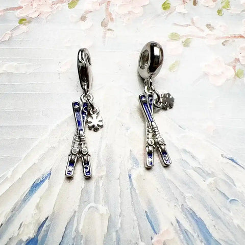 Two ski charm earrings.