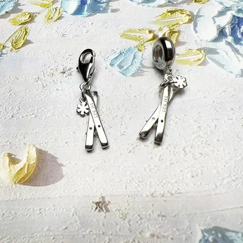 Silver ski charms.