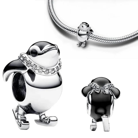 Skiing Penguin Charm - Adorable skiing penguin charm, a playful addition to winter-themed charm collections.