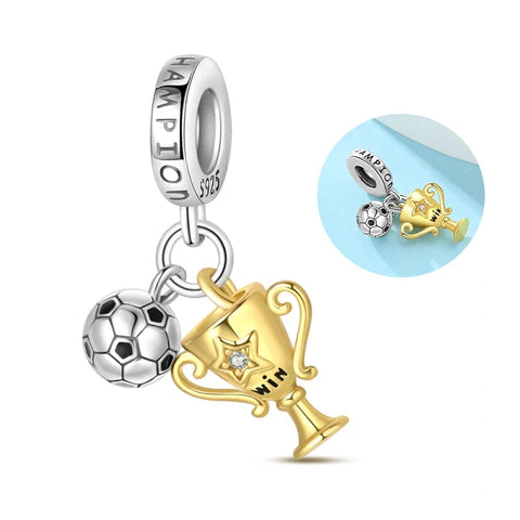 Soccer Trophy and Ball Charm for Champions in Sterling Silver - Sterling silver charm with a golden trophy and soccer ball, featuring the word "WIN" and a crystal accent, perfect for sports enthusiasts.