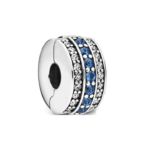 Sparkling Blue Heart Charm with Crystal and Sterling Silver Design - Sterling silver heart-shaped charm with blue gemstones and crystal detailing for a romantic, elegant touch.