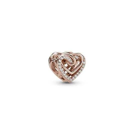 Sparkling Entwined Hearts Charm Pandora Rose - Shimmering heart charm with Pandora Rose finish, ideal for special occasions.