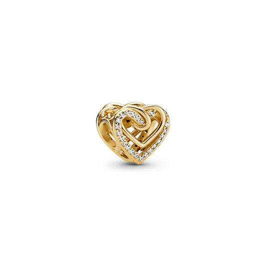 Sparkling entwined hearts charm in Pandora Shine, a romantic and elegant accessory for bracelets