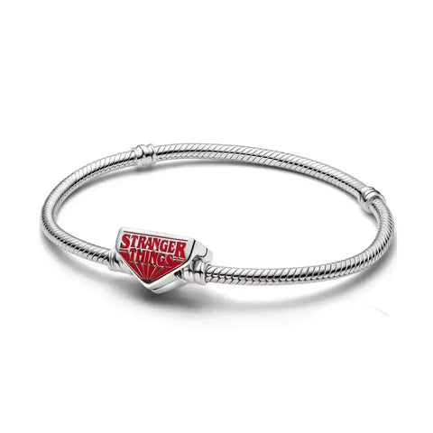Silver bracelet with a 'Stranger Things' charm on a white background