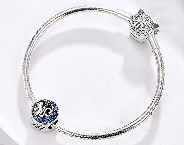 sterling silver cat moon and stars charm with blue crystals