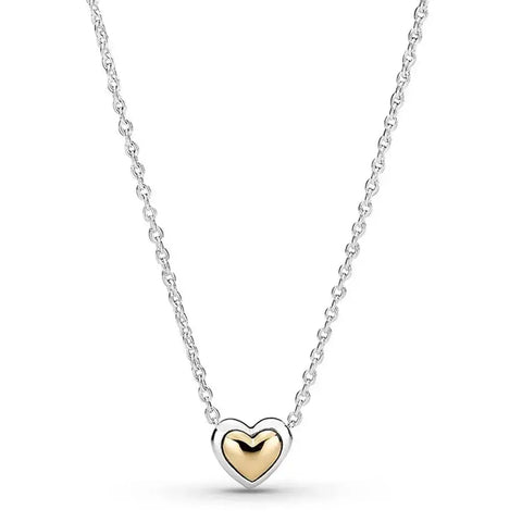 Sterling Silver and Gold Heart Pendant Necklace for Women - Sterling silver necklace with a heart-shaped pendant featuring a gold center, symbolizing love and elegance.