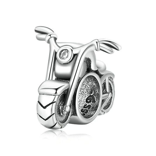 Silver motorcycle charm with intricate detailing, adding adventure to charm bracelets by Pandora.