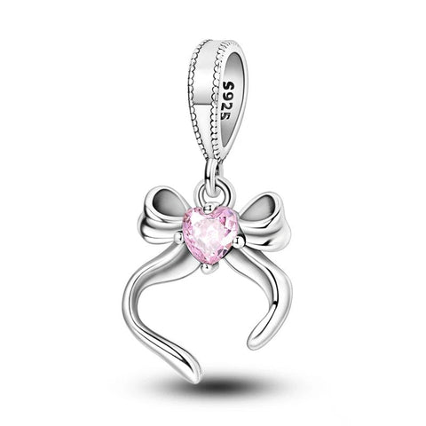 Sterling Silver Ribbon Charm with Pink Heart Crystal - Sterling silver bow heart charm with pink crystal