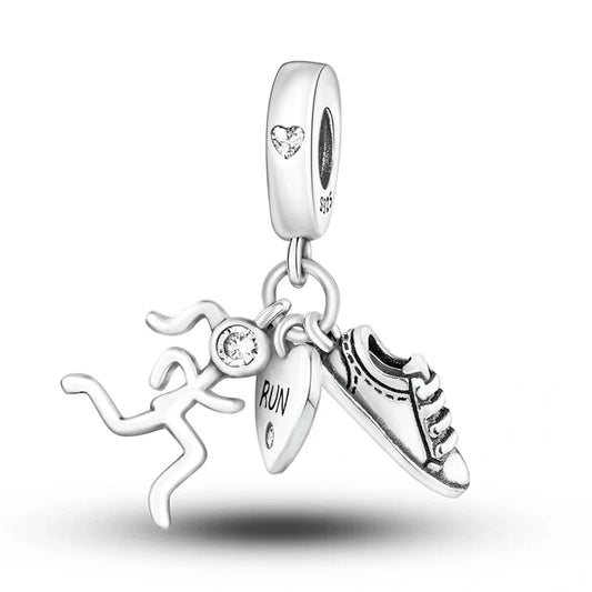 Sterling silver running-themed charm with a runner, sneaker, and heart inscribed with RUN.