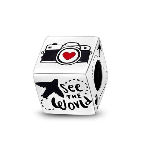 Sterling Silver Cube Charm Travel Icons and See the World Design - Sterling silver cube charm featuring travel icons including an airplane, camera, and 'See the World' phrase, perfect for travelers.