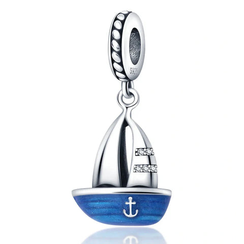 Sterling Silver Sailboat Charm with Blue Enamel and Anchor - Sterling silver sailboat charm with blue enamel base and anchor design, ideal for lovers of the sea and nautical adventures.