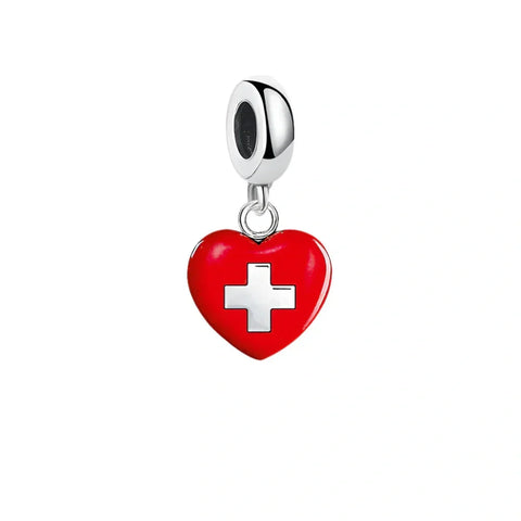 Red heart charm with white cross.