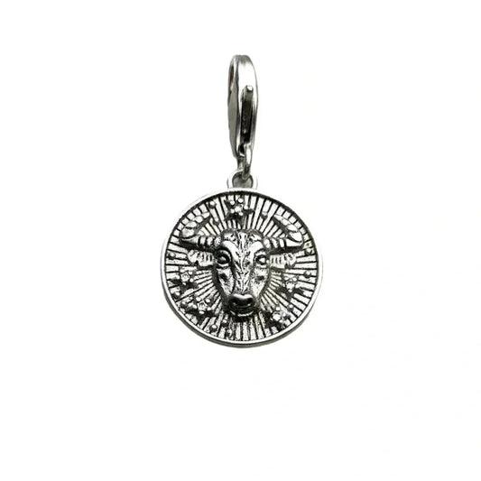 Silver Taurus zodiac charm.