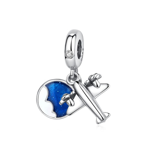Travel Globe & Airplane Dangle Charm, Sterling Silver - Silver dangle charm featuring a blue enamel globe and silver airplane pendant, with a cubic zirconia accent on the bail, shown against a white background