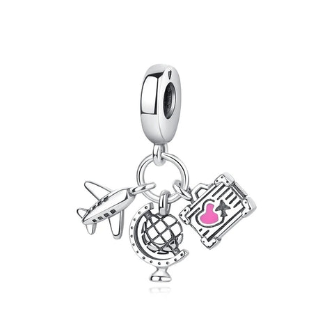Travel Set Charm – Airplane, Globe & Suitcase Pendant - Silver clip-on charm with three dangles: a miniature airplane, a globe, and a suitcase with pink enamel detail, shown on a white background