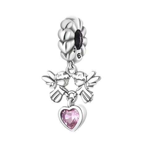 Twin Angels Charm with Pink Heart Gemstone in Sterling Silver - Sterling silver charm featuring twin angels holding a pink heart-shaped gemstone, ideal for charm bracelets or necklaces.