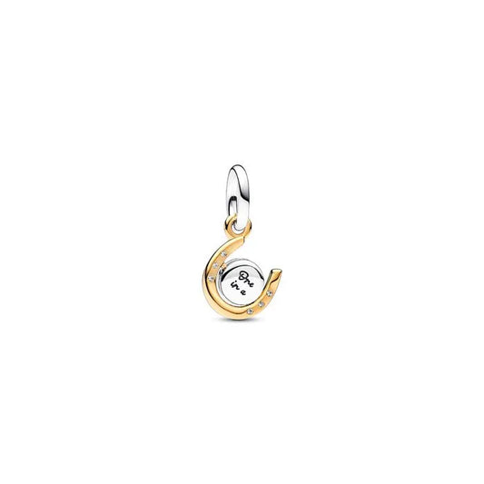 Two-Tone Spinning Disc Horseshoe Dangle Charm - Elegant horseshoe charm with spinning disc in two-tone, symbolizing good luck.