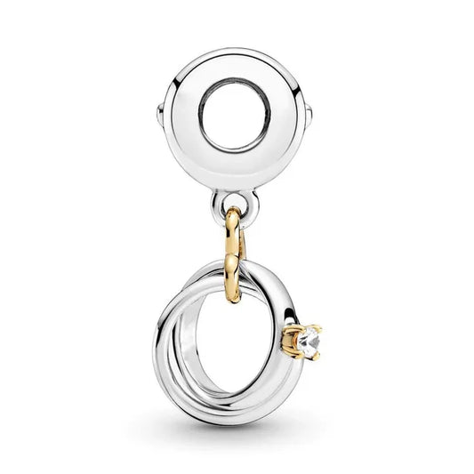 Two-Tone Wedding Rings Dangle Charm - Wedding rings dangle charm in two-tone, symbolizing love and commitment.