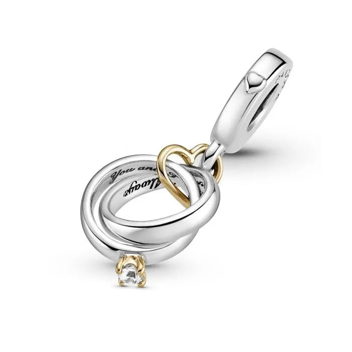 Two-Tone Wedding Rings Dangle Charm - Charming wedding rings dangle in two-tone, perfect for romantic themes.