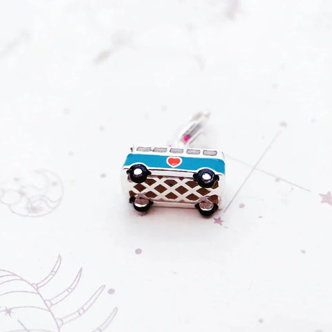 Blue and silver bus charm.