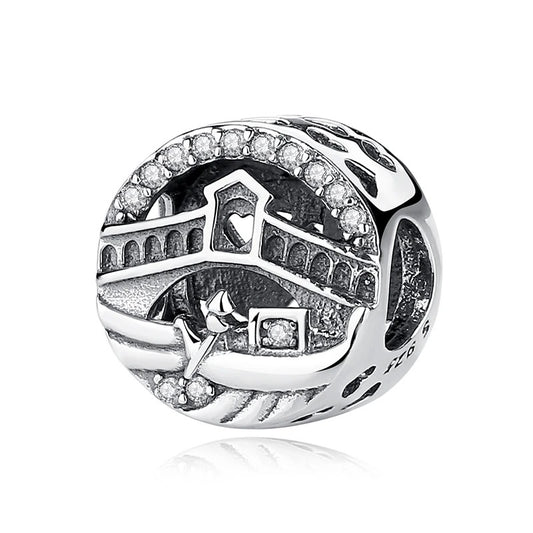 Silver-tone charm depicting a Venice gondola beneath an arched bridge with clear crystal stones along the top, clip-on bracelet charm