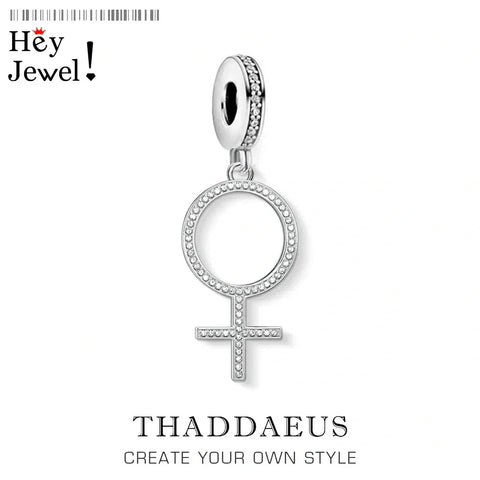 Silver female symbol charm.