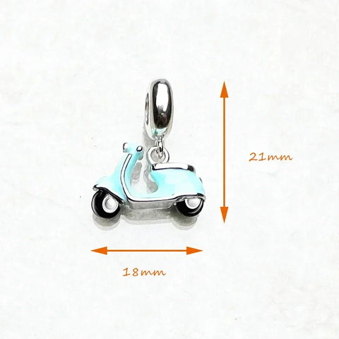 Light blue scooter charm.