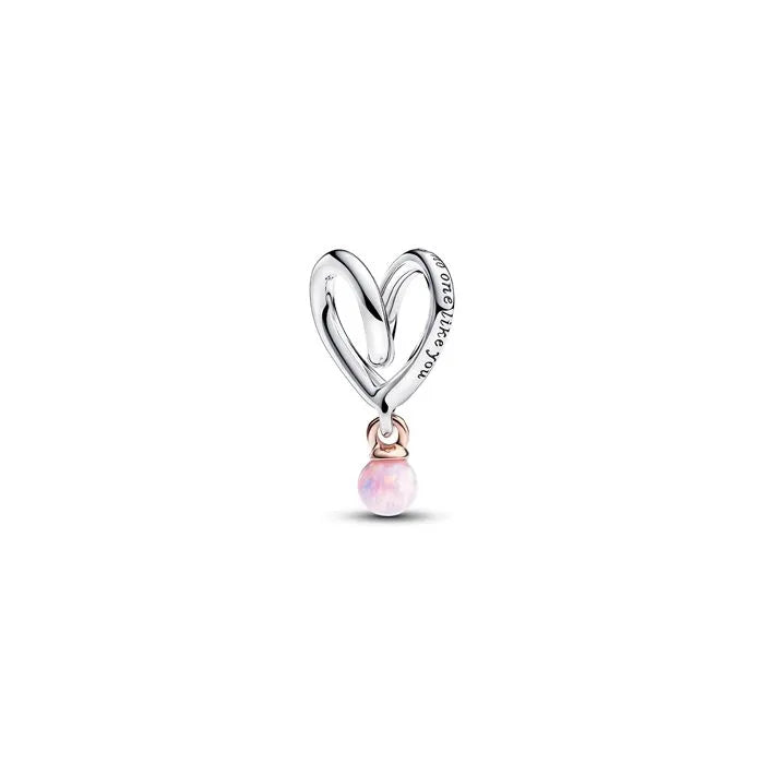 Wrapped Heart Charm Pandora Rose - Heart charm in Pandora Rose, wrapped with elegance, symbolizing cherished love.