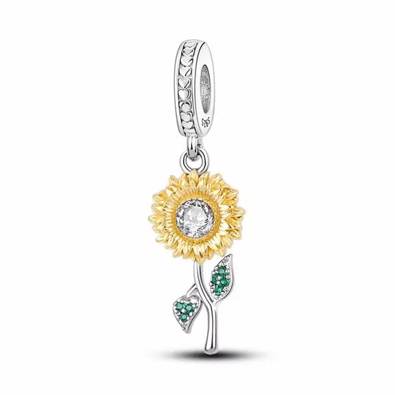 Dazzling Sunflower Sterling Silver Charm with Green Gemstone Leaves - Sterling silver charm featuband a yellow sunflower with a sparkling crystal center.