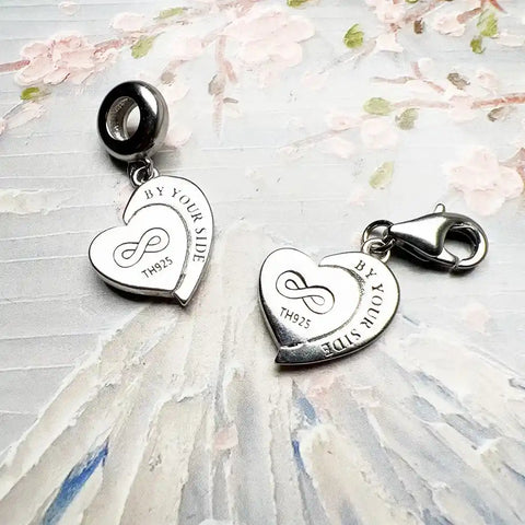Silver heart-shaped charm pendants.