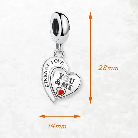 Silver heart charm.