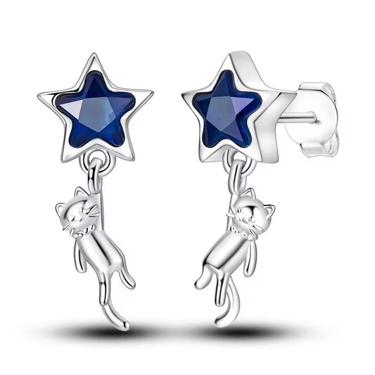 Sterling silver star and cat dangle earrings with playful design.