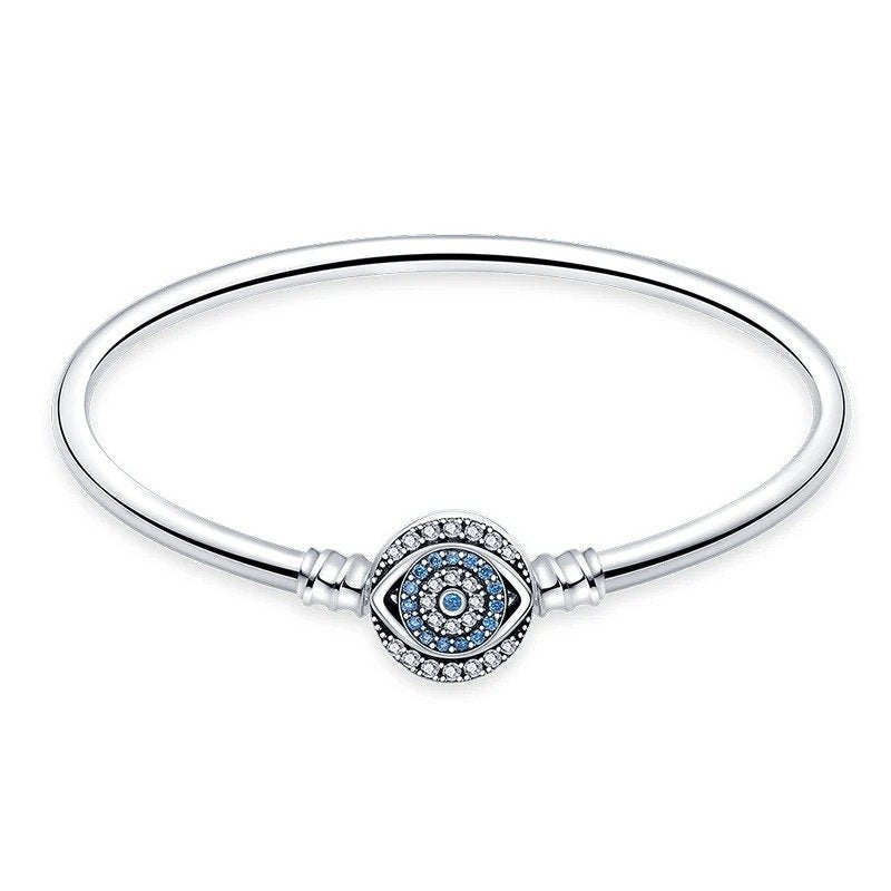 Blue Evil Eye Sterling Silver Charm Bracelet with blue and crystal evil eye charm.