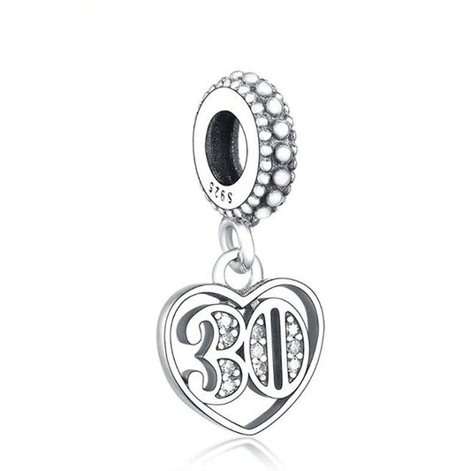 Sterling silver heart charm with the number "30" and sparkling crystals.