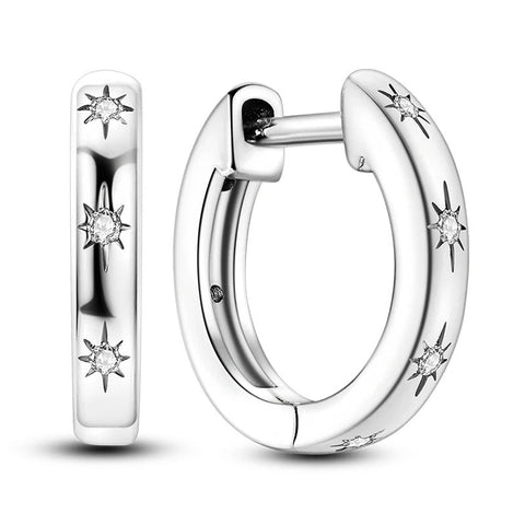 Sterling Silver Star Engraved Huggie Hoop Earrings - Sterling silver huggie hoop earrings with star engravings.