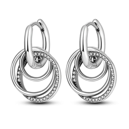 Sterling silver triple circle hoop earrings with interlocking design.