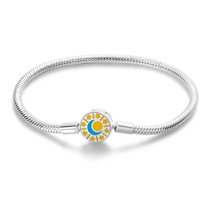 Celestial harmony charm sterling silver snake chain bracelet with sun and moon design