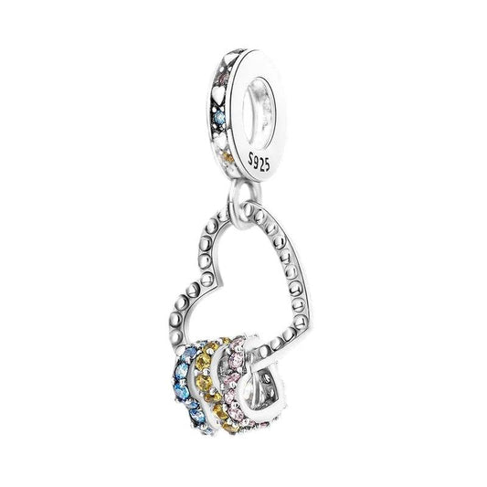 Sterling silver heart charm with rainbow-colored crystals.