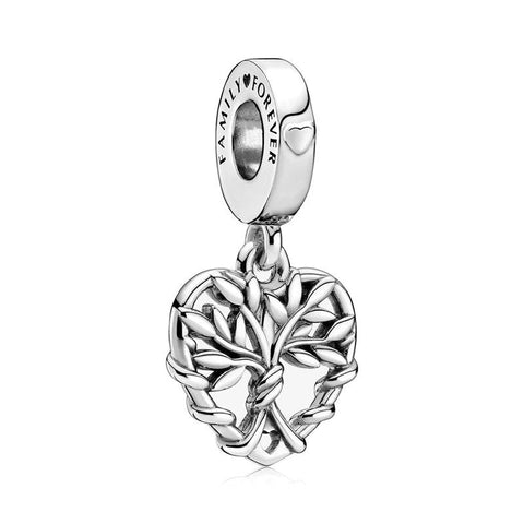 Family Tree Heart Charm - Sterling silver heart charm featuring an intricate tree design.