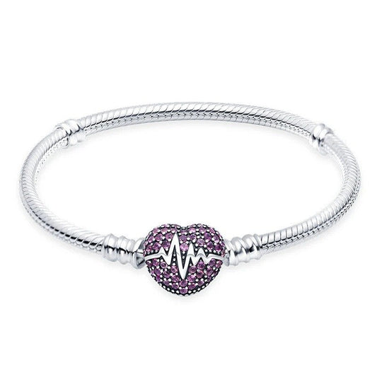 Sterling silver bracelet with a pink heartbeat charm, compatible with Pandora charms.