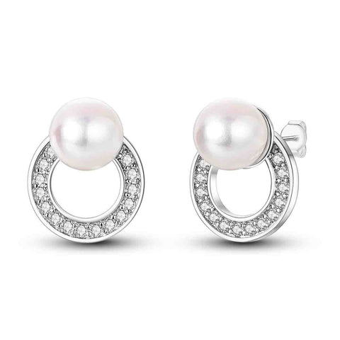 Sterling silver circle earrings with a pearl and diamond accents.