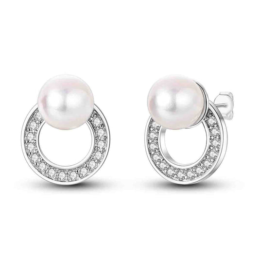 Sterling silver circle earrings with a pearl and diamond accents.