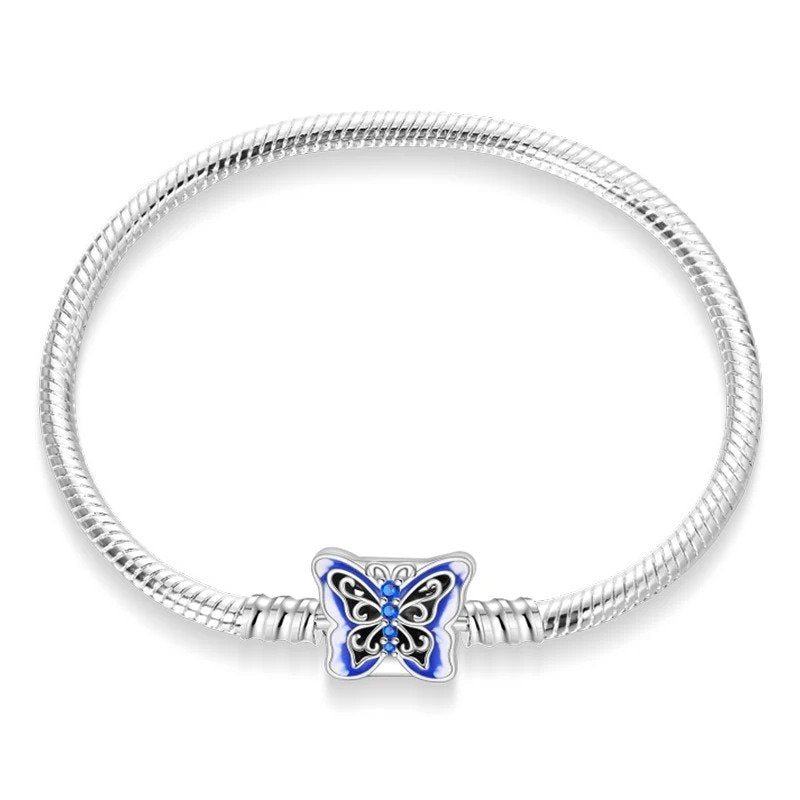 Butterfly charm sterling silver snake chain bracelet with blue enamel and gemstones