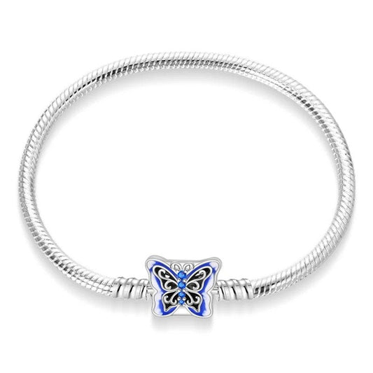 Butterfly charm sterling silver snake chain bracelet with blue enamel and gemstones