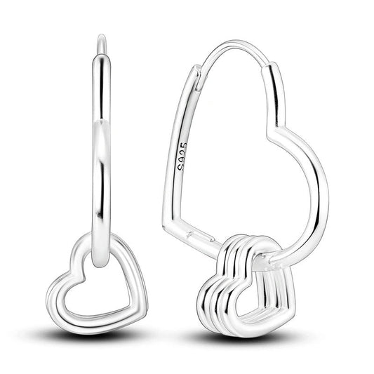 Sterling silver hoop earrings with heart outline design.