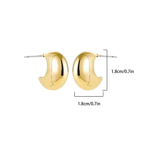 Crescent moon gold earrings measuring .cm in height and width, displayed with dimensions.